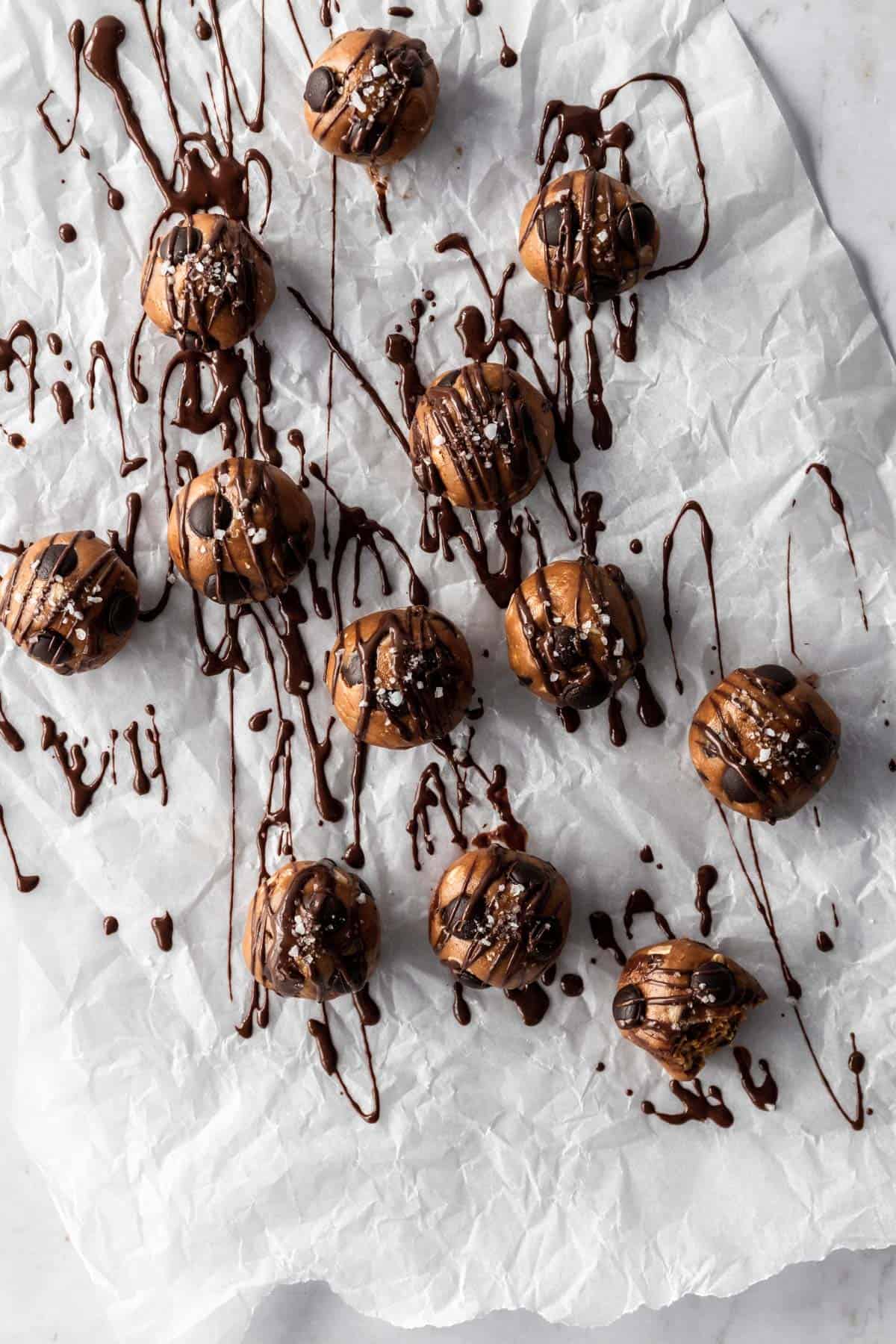peanut butter balls sprinkled with salt and chocolate chips