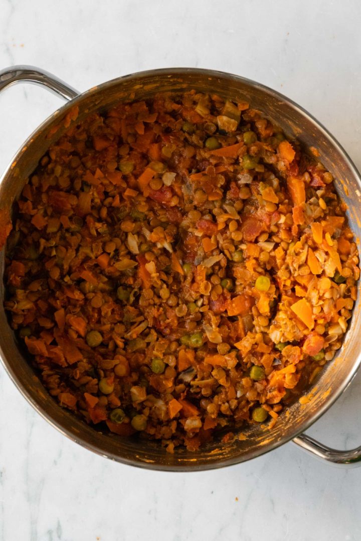 a cooking pot with lentil filling