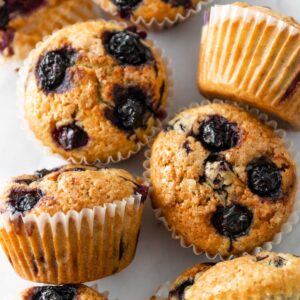 blueberry muffins on a marble board