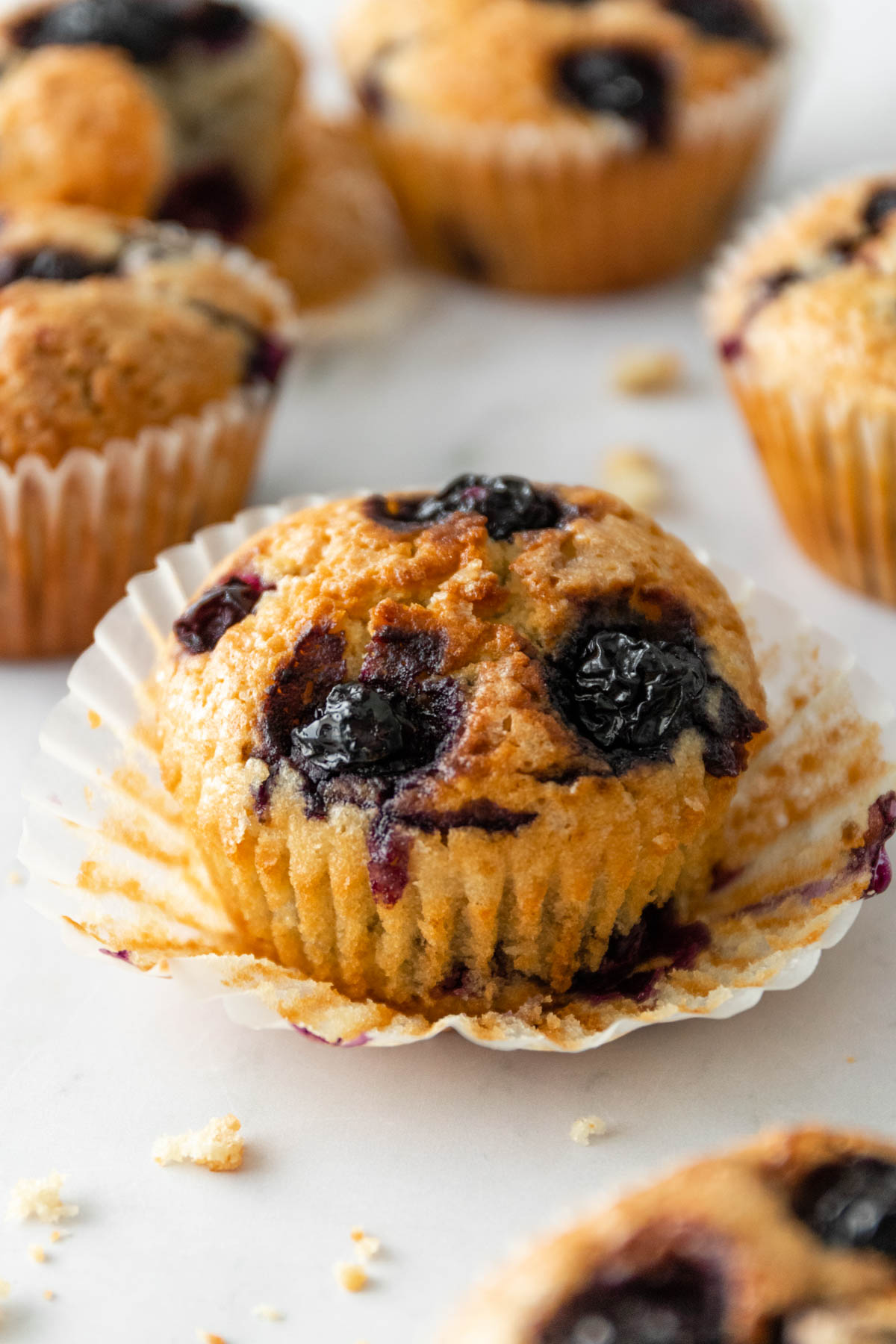 blueberry muffins on a marble board