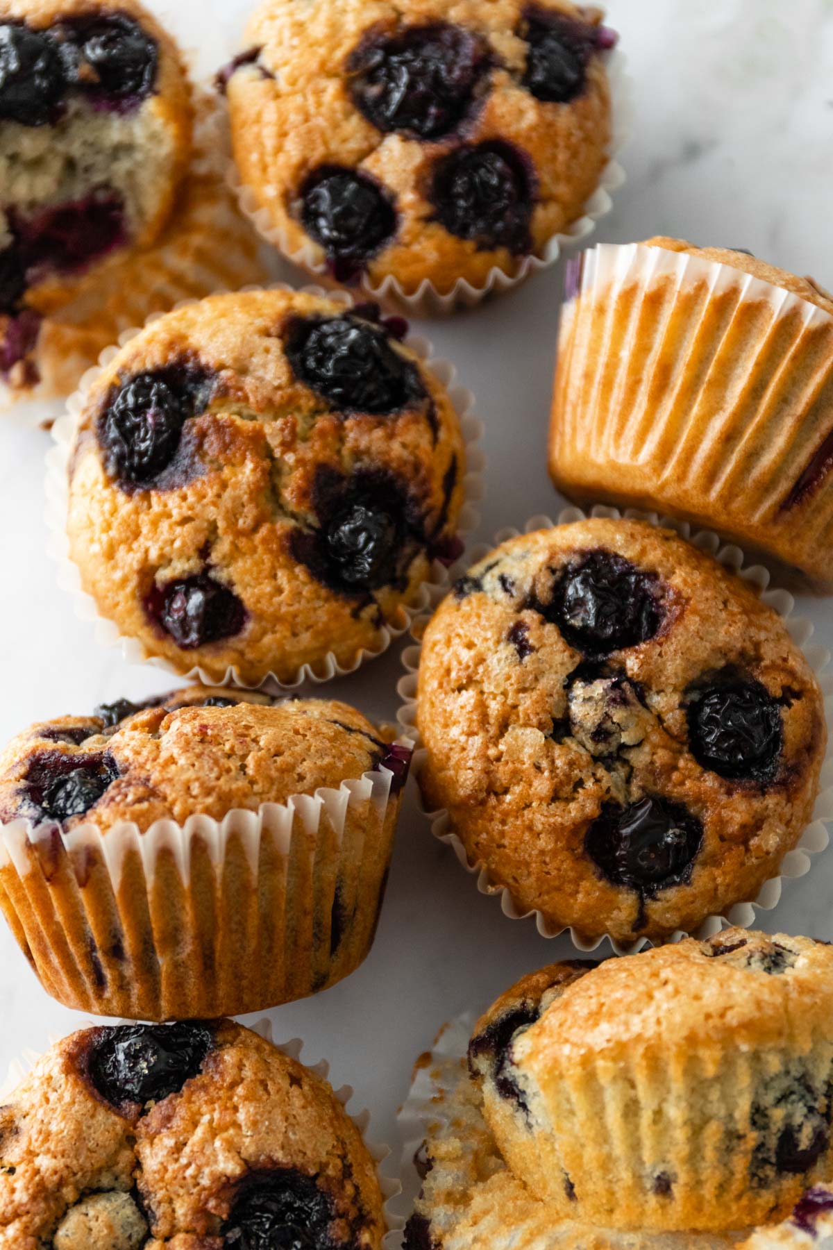 blueberry muffins on a marble board