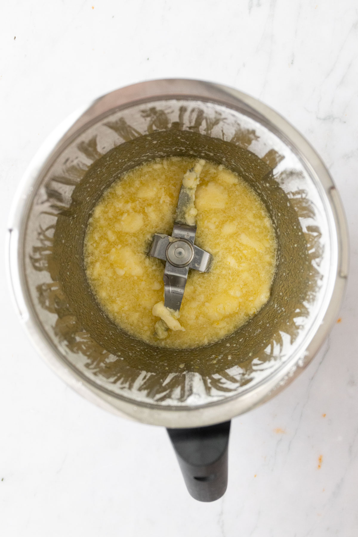 butter, lemon juice, and sugar inside the Thermomix bowl.